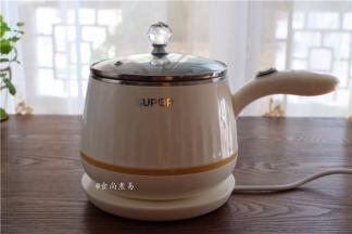 遮上小煮锅盖子，接通电源，煲30分钟即可