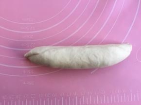 卷起，收口捏紧