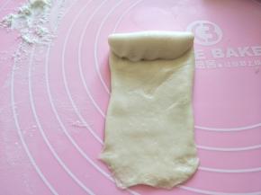 翻面，从上往下卷起。