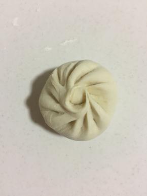 捏出褶皱，包好。