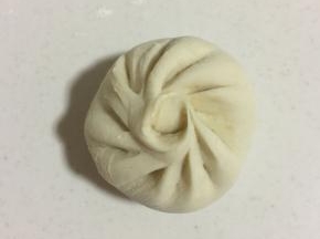 捏出褶皱，包好。