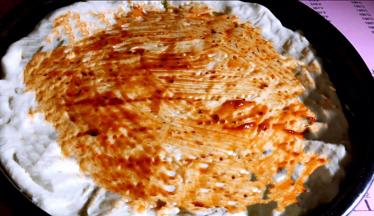 再刷上一层披萨酱