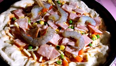 最后放入腌制好的基围虾