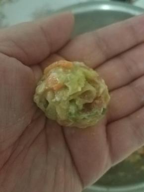 喜欢圆圆的，可以用手轻轻的揉圆。