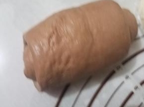 再次卷起来。