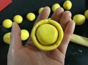 用虎口收圆。