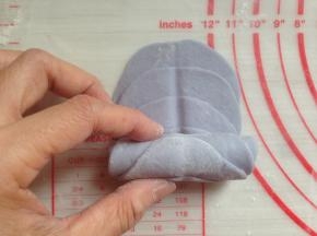 从下往上卷起来