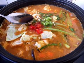 淋入1小勺的米醋提香。