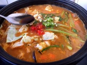 淋入1小勺的米醋提香。