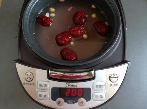 选择电饭煲的煮粥功能，时间2小时