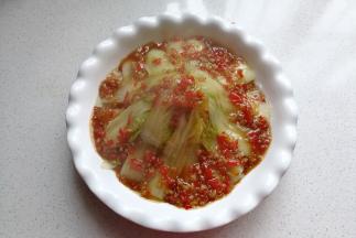 然后再淋上先前炒好的蒜蓉酱放入蒸锅大火蒸8分钟即好（我这是蒸好后刚出锅的）