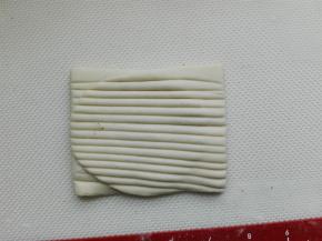 用刮刀或刀背印上痕迹