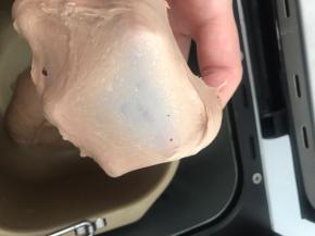 直到能拉出很薄的膜（不需要出手套膜）