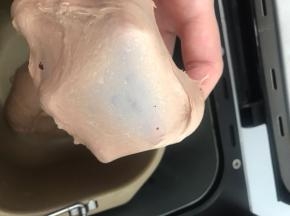直到能拉出很薄的膜（不需要出手套膜）
