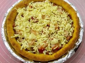 取出撒其余的奶酪，再次入烤箱200度烤7分钟