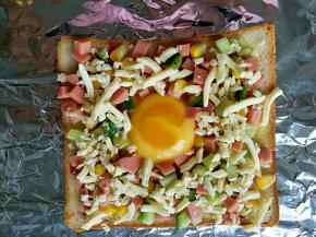 最后铺上芝士碎