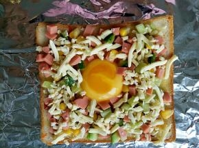 最后铺上芝士碎