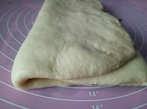 再把剩下的1/3也向中间折起