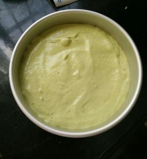 把蛋糕糊倒进模具里，用力震一下。然后放到预热好的烤箱，上管120度下管110度烤50~60分钟，出炉倒扣凉凉。