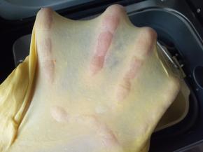 揉至出现手套膜