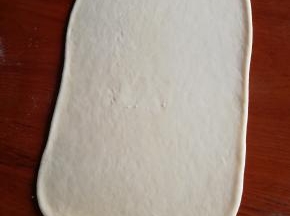 水油皮用擀面杖赶开