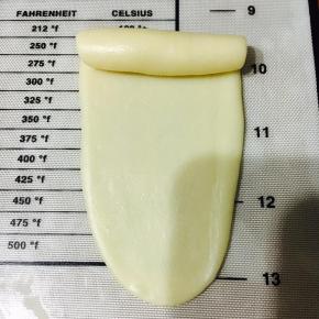 从上卷向至下端！