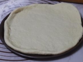 .放入学厨9寸不沾披萨烤盘