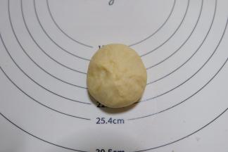 包起来捏紧收口。