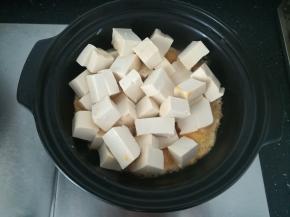 放入豆腐