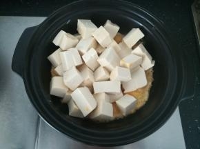 放入豆腐