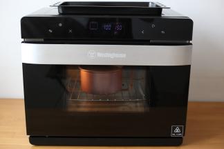 放入西屋蒸烤箱内中下层烤制上下管150度45分钟