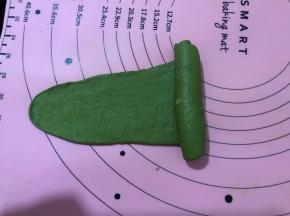 再从大头卷向小头