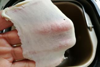 揉面至这种完全扩展阶段后，也就是手套膜状态，即揉面完成