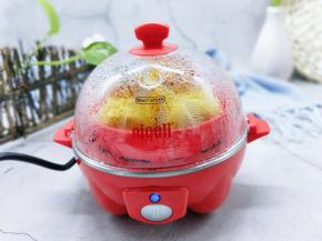 启动煮蛋器，蒸12分钟即可。