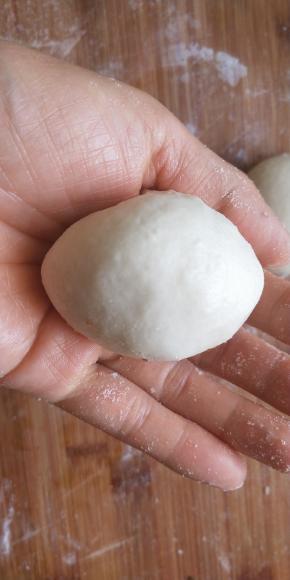 虎口收口并捏紧