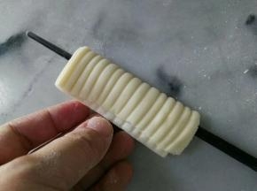 把面片挑起。