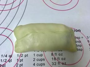 包起来，捏好收口