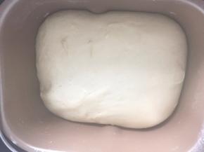 拔掉电源，盖上盖子，发酵至两倍大（冬天需要启动发酵功能）