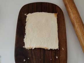 用擀面杖擀压实