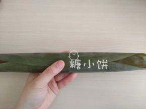 顺长包裹起来（即上下翻折包裹起来，如图）