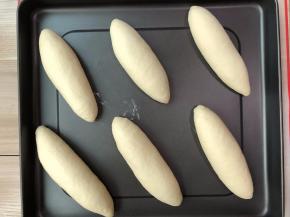 全部码在烤盘上，收口朝下