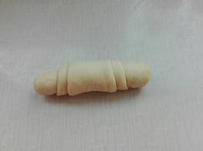 自上而下卷起来，收口朝下