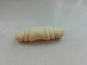 自上而下卷起来，收口朝下