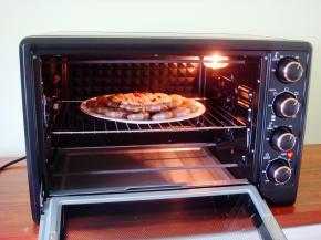 九阳KX—32J99烤箱提前预热，上下200度，放置中层。