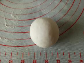 包好后收口线下滚圆