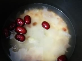 按电饭煲的煮粥键即可