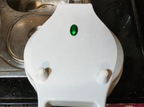 盖上电铛板，加热3分钟