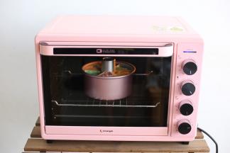 再放进预热好的长帝炫彩烤箱中下层上下管150度烤制35分钟即可