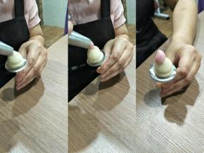 韩式122花嘴，轻轻插入花柱，挤，花嘴向上提，转上一圈半，向下拉，一个花心就做好了