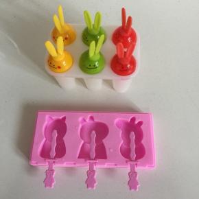 小猪佩奇雪糕模具和棒冰模具清洗干净，开水烫一下消毒后，擦干水分备用。